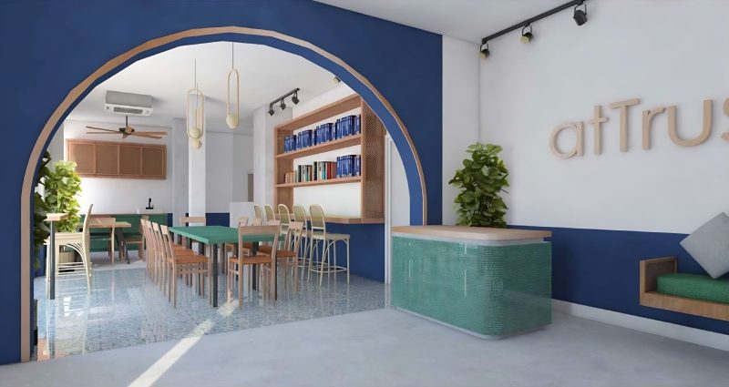 atTrus lobby and dining area behind a blue arch