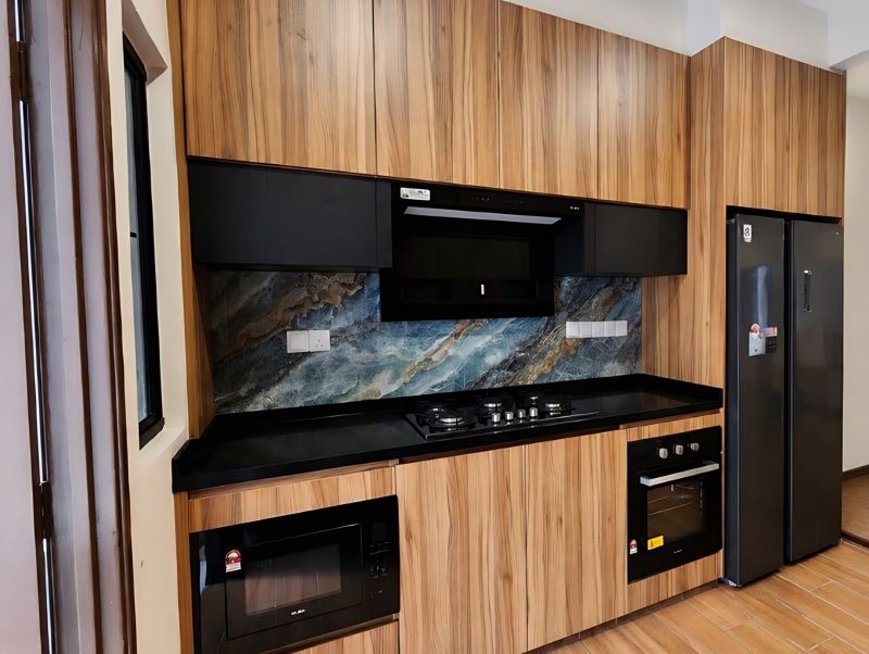 Kitchen with timber cabinetry and stone backsplash