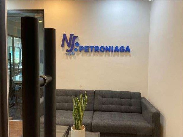 Reception with NJ Petroniaga logo wall