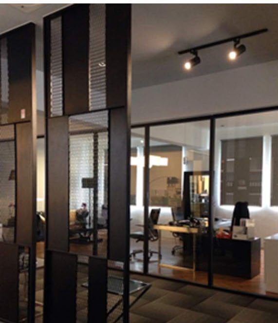 Private office behind glass partitions
